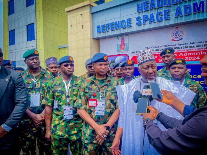 BADARU WITH MILITARY MEN