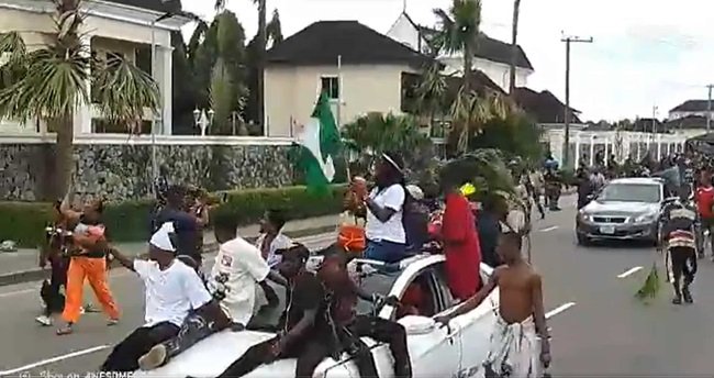 PROTESTERS AT WIKE RESIDENCE