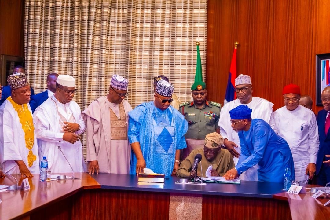 TAX BILLS SIGNED