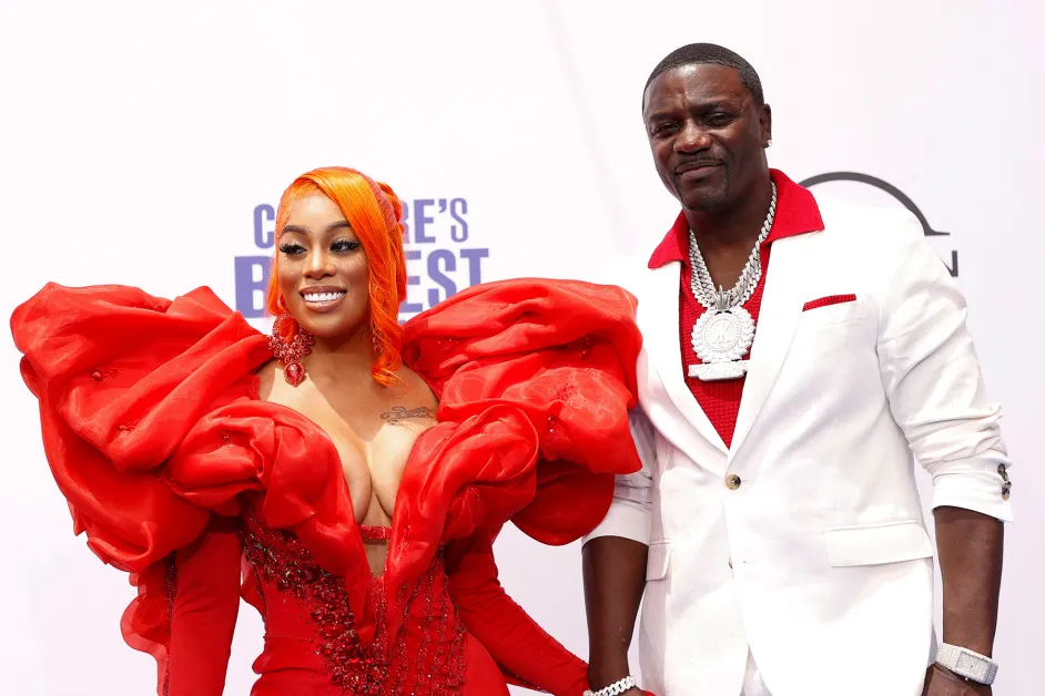 AKON AND WIFE