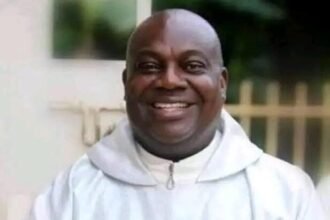 PRIEST DIES