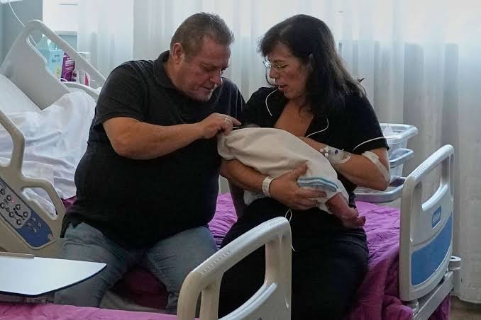 WOMAN GIVES BIRTH